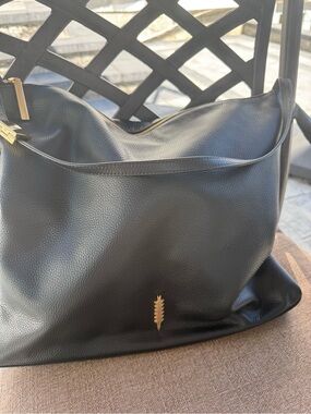 Black Pebbled Leather Shoulder/ crossbody bag.